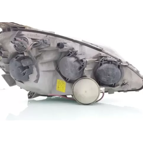 1305239069 фара передняя Mazda 626 2000