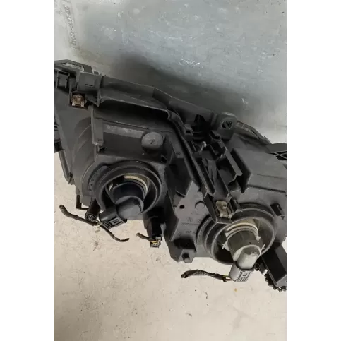 6916059 фара передня BMW 3 E46 2004