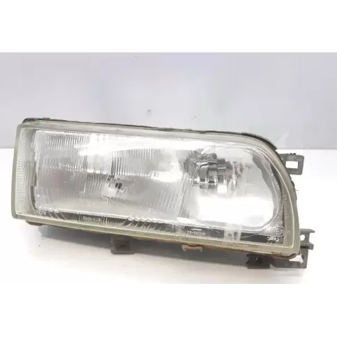 B601070J15 фара передняя Nissan Primera 1990