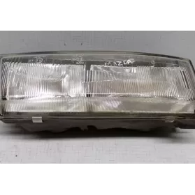 0014458R фара передняя Mitsubishi Lancer 1990