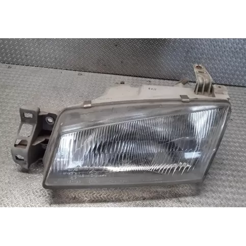 0K9AA51020L фара передняя KIA Clarus 1999