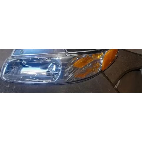 203164891A фара передня Chrysler Voyager 1997
