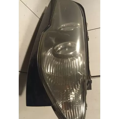 6920599 фара передня BMW 3 E46 2004