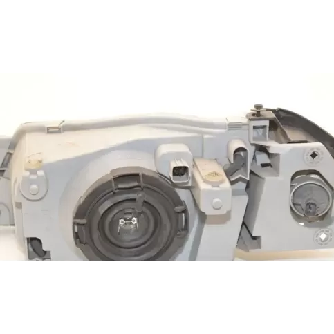 B25D51060B фара передня Mazda 323 F 1998