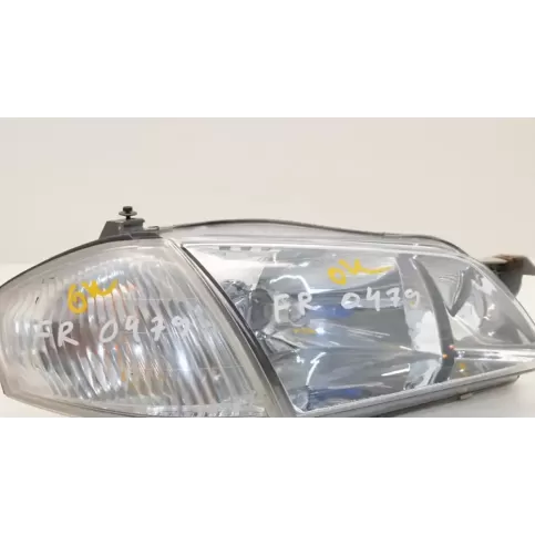 B25D51060B фара передня Mazda 323 F 1998