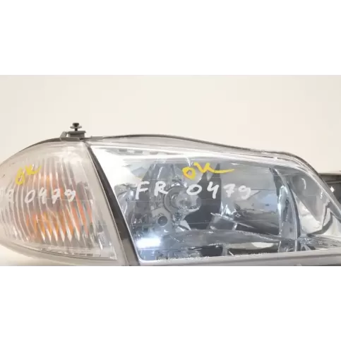 B25D51060B фара передня Mazda 323 F 1998