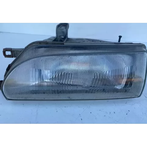 2121140L фара передняя Toyota Corolla E90 1990