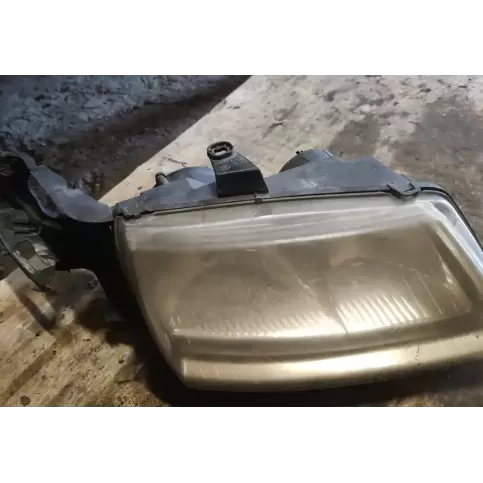 89010467 фара передняя Saab 9-5 2004