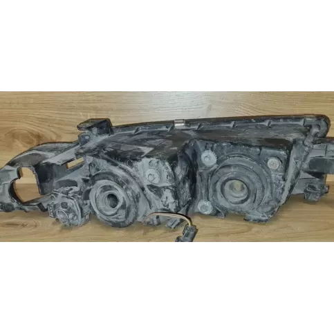 90737900 фара передня Mitsubishi Galant 1999
