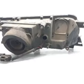 B606070J17 фара передняя Nissan Primera 1990