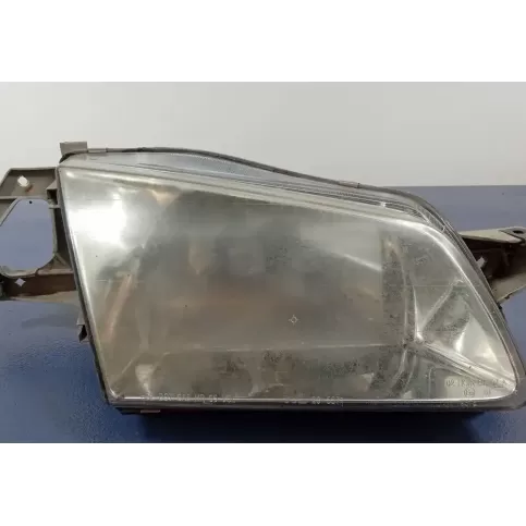 20-5571 фара передняя Mazda 323 2000