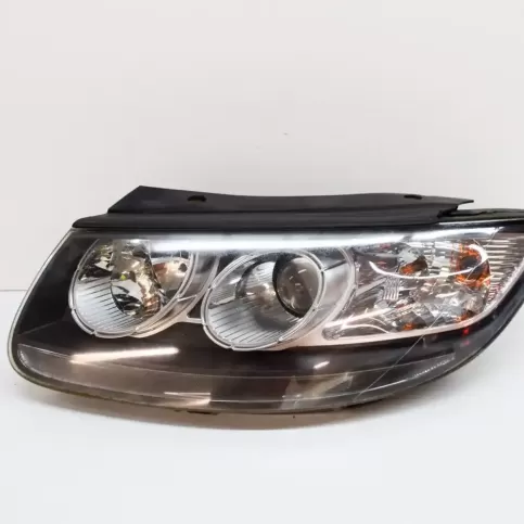 56BG31 фара передняя KIA Carnival 2005