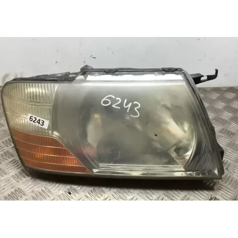 E131759651 фара передня Mitsubishi Pajero 2004