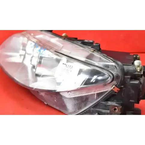 F014002476L фара передняя Mazda 626 2002