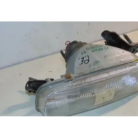 10051272AR фара передняя Daihatsu Applause 1995