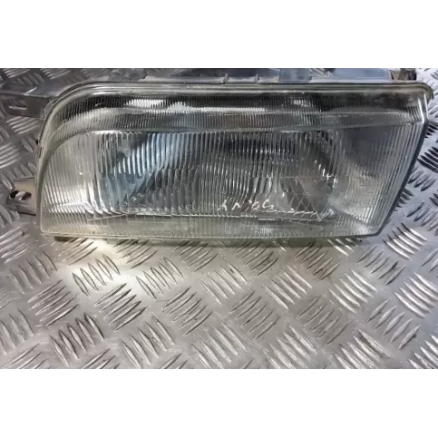 203125 фара передняя Nissan Sunny 1995