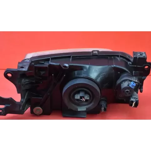 P1001L фара передняя Mazda Demio 2002