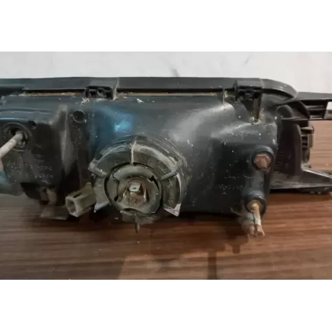 2151140L фара передняя Nissan Sunny 1994