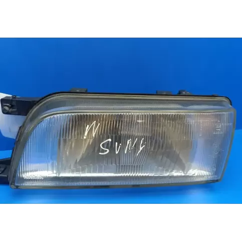 7R010279 фара передня Nissan Sunny 1993