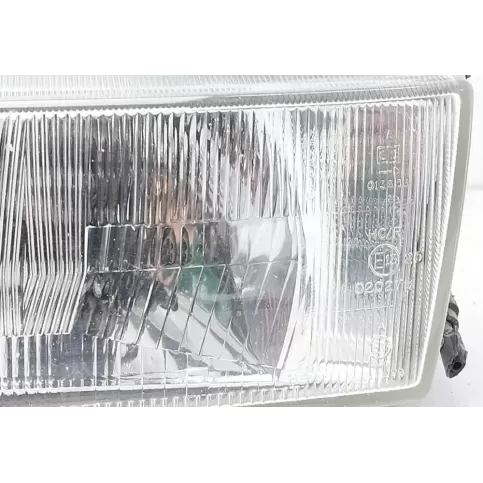 B606063C02 фара передняя Nissan Sunny 1990