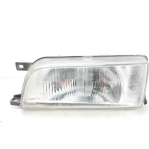 B606063C02 фара передняя Nissan Sunny 1990