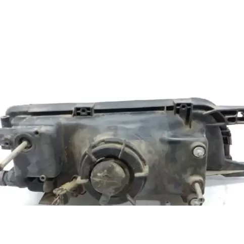 B606063C12 фара передняя Nissan Sunny 1994
