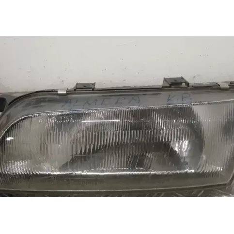 E134739 фара передняя Nissan Almera 1997