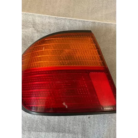 ZDS111323L фара задняя Nissan Primera 1997