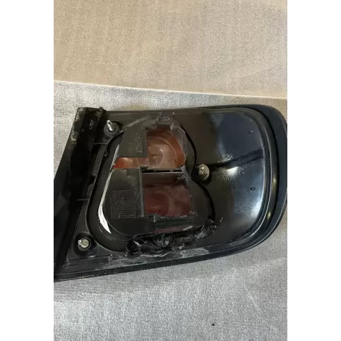 ZDS111323L фара задняя Nissan Primera 1997